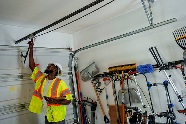 Professional Garage Door Panel Replacement technician working in Henderson County County, IL